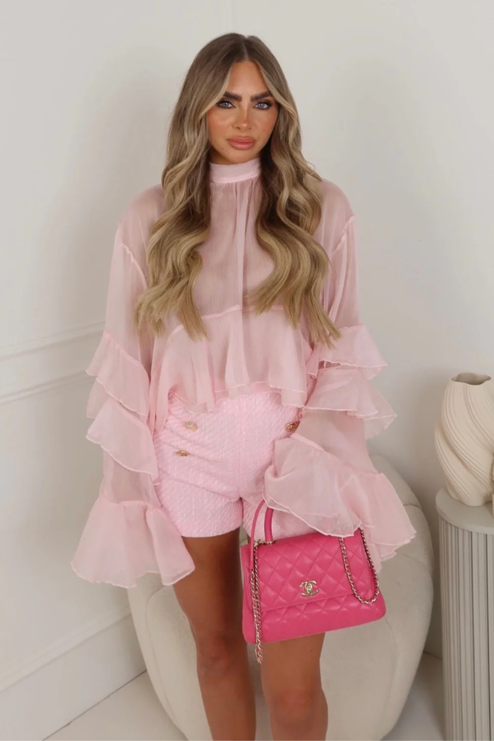 Florentina pink sheer flared sleeve ruffle hem blouse