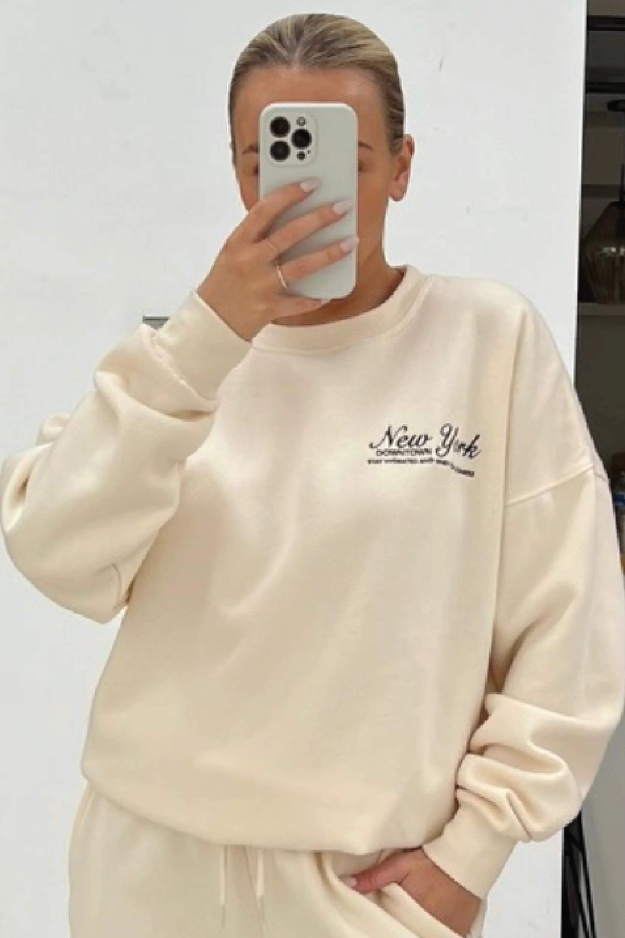 New York black embroidered ecru sweater