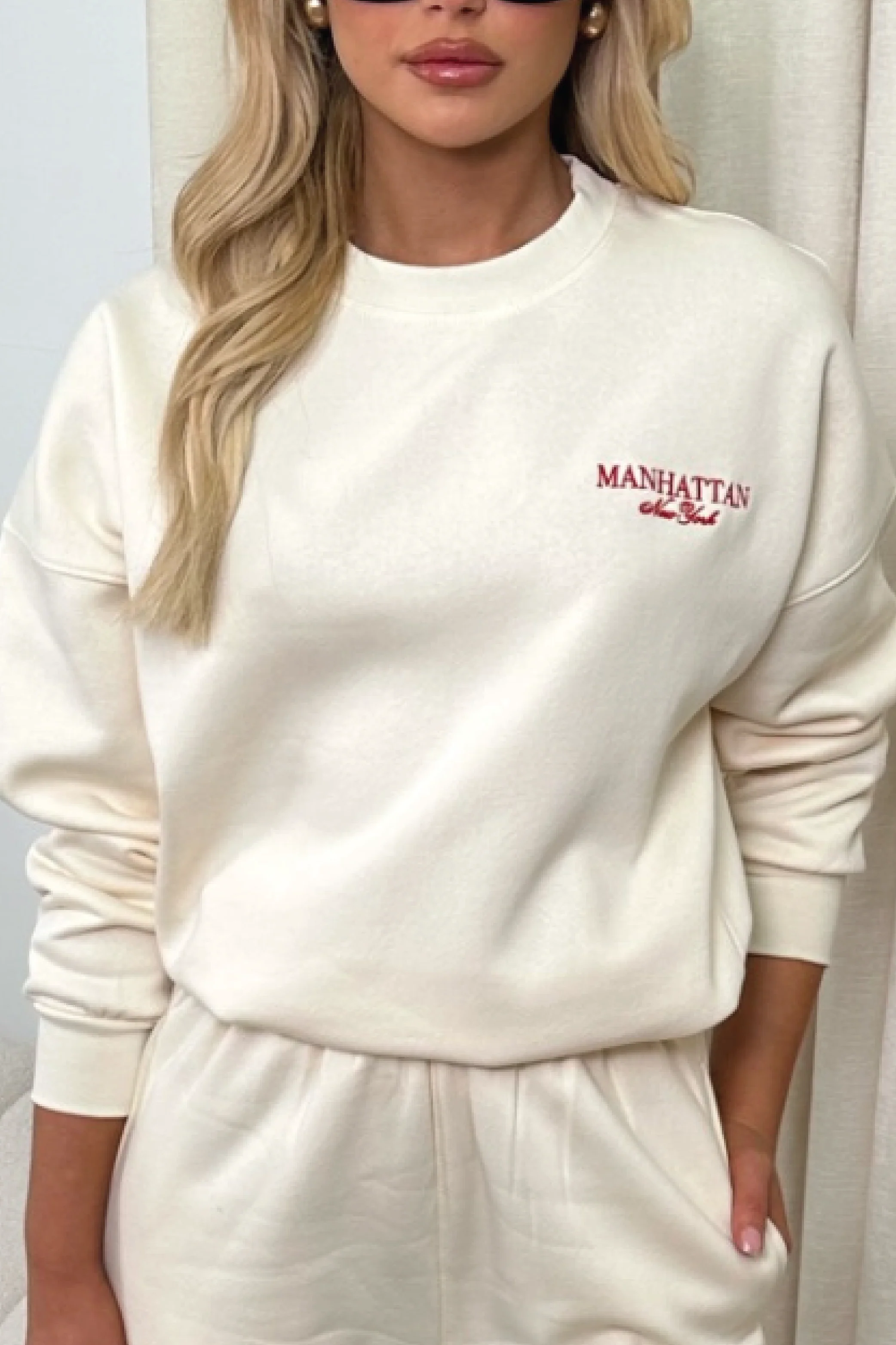 New York red embroidered ecru sweater