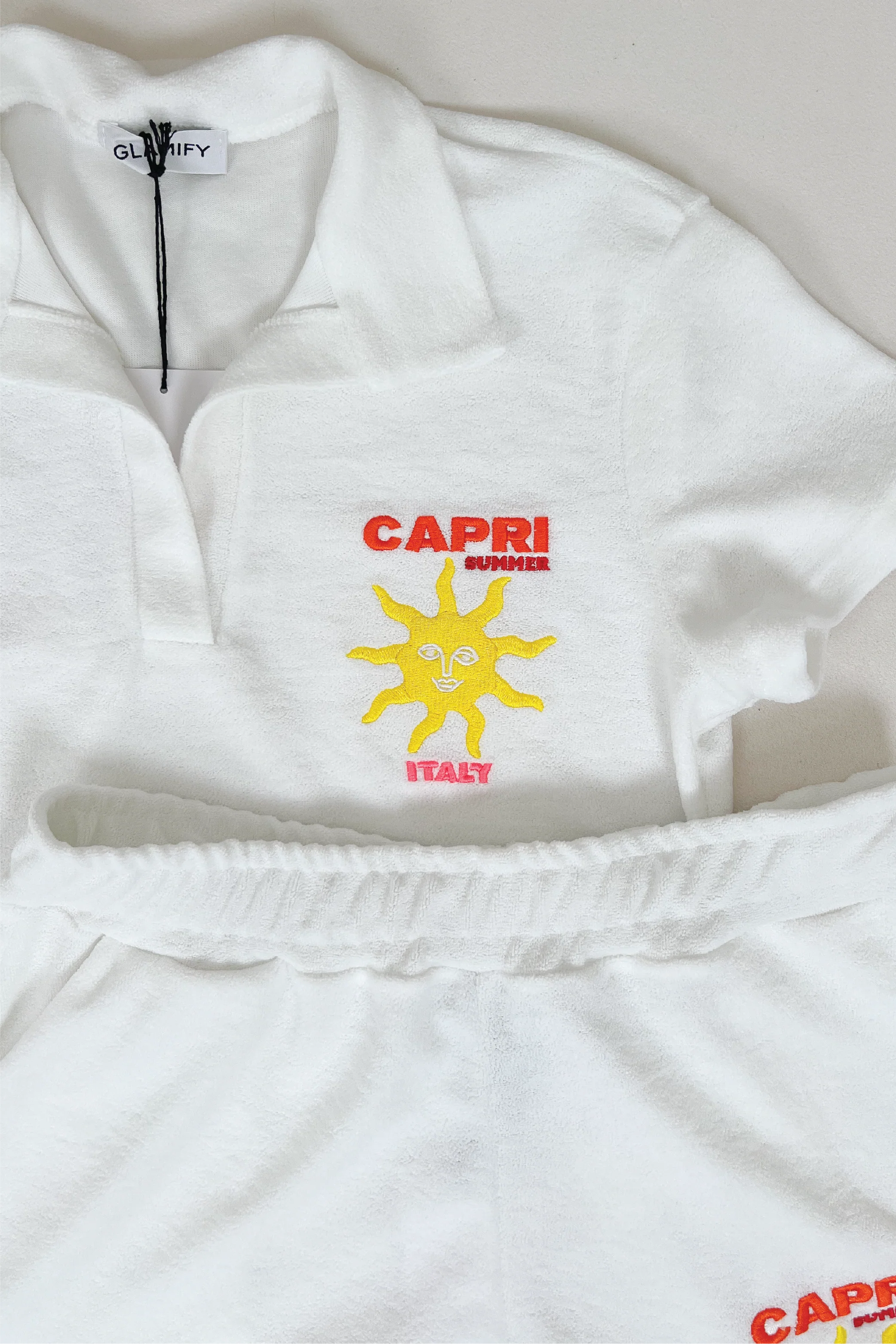 Capri white & orange embroidered towelling polo shorts co ord - Image 3