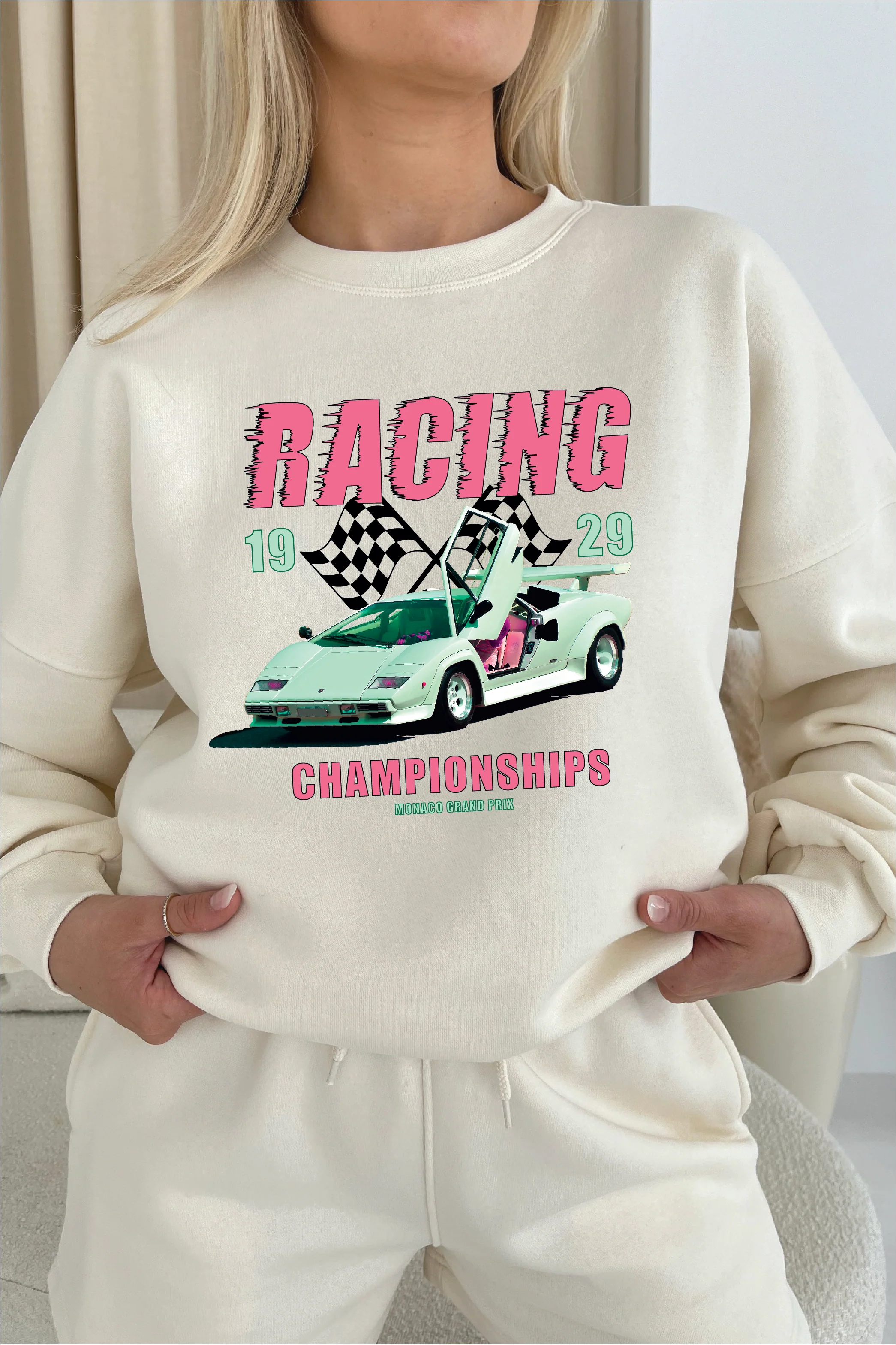 Racing champions printed ecru sweater