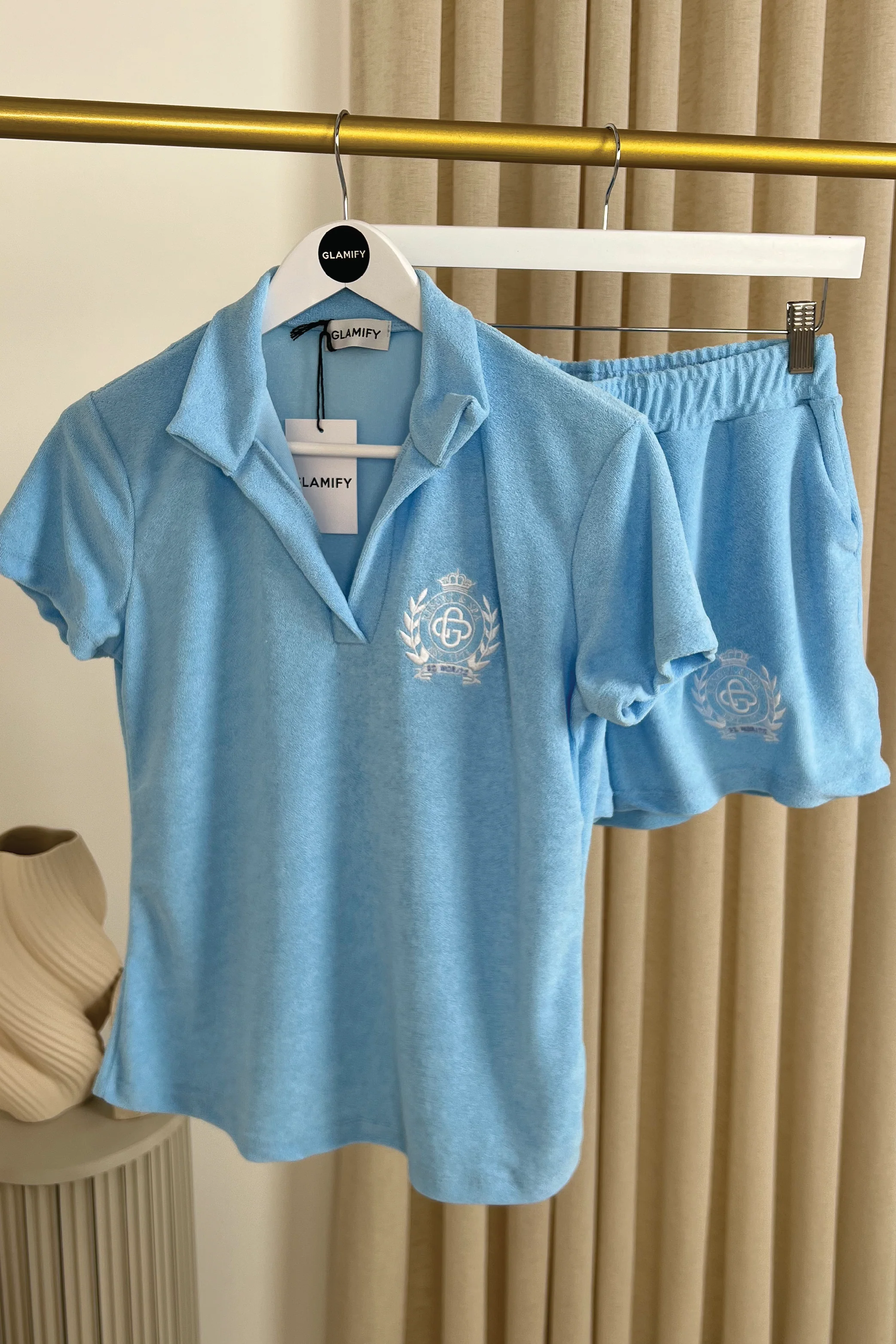 St Moritz blue embroidered towelling polo shorts co-ord - Image 4